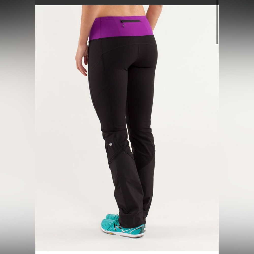Lululemon leggings with purple rim and snow pants material bottoms with POCKETS